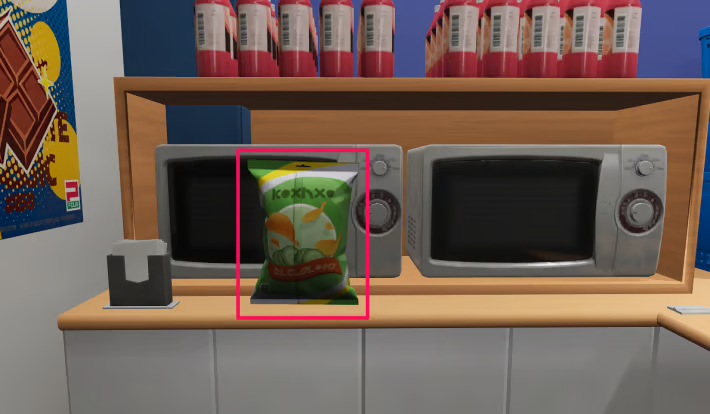In front of the microwave near the register